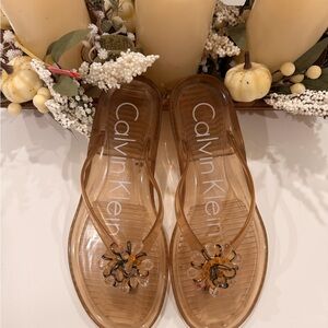 Calvin Klein Women's Brown Sandals with Floral Accent